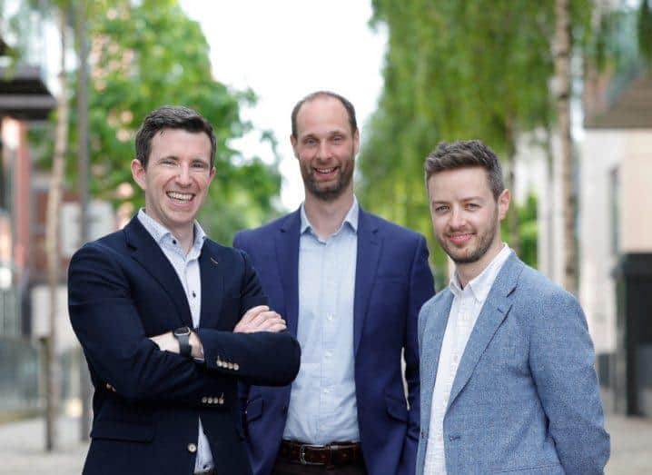 The edgetier founding team standing in a tree lined street